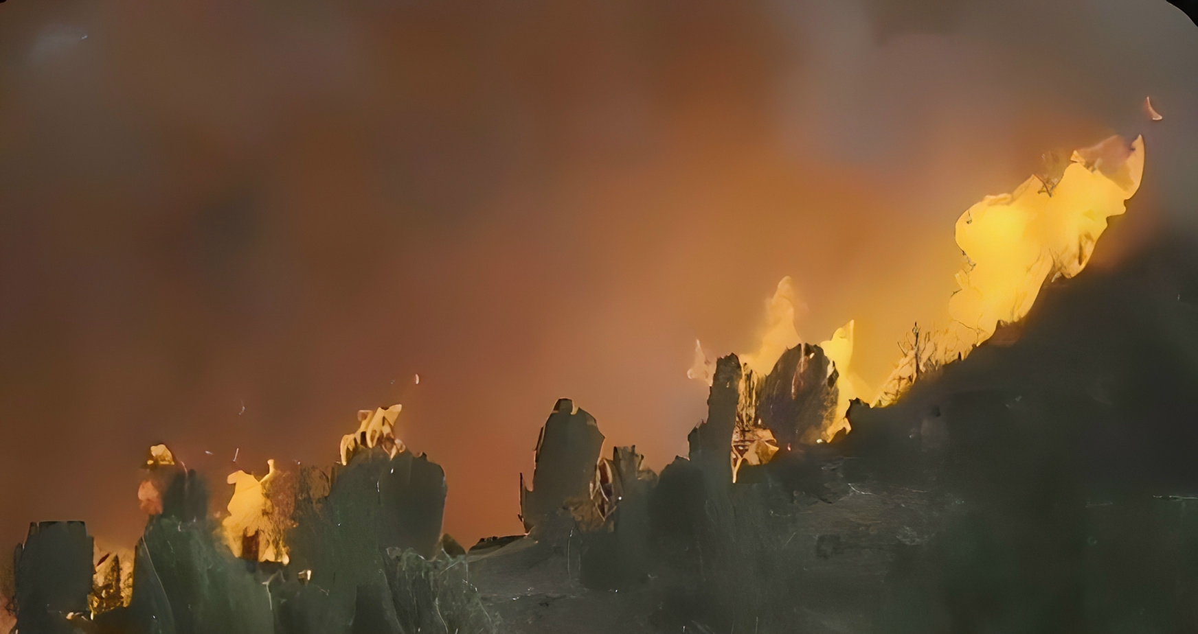 Thousands of buildings threatened by California wildfires
